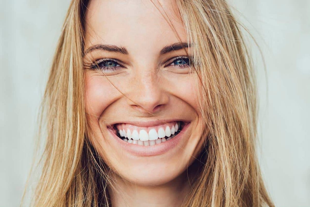 How to Smile: The Science, Art, and Benefits of Smiling